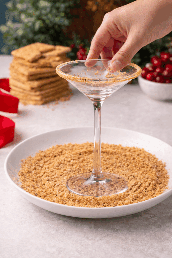 martini glass with crushed graham crackers
