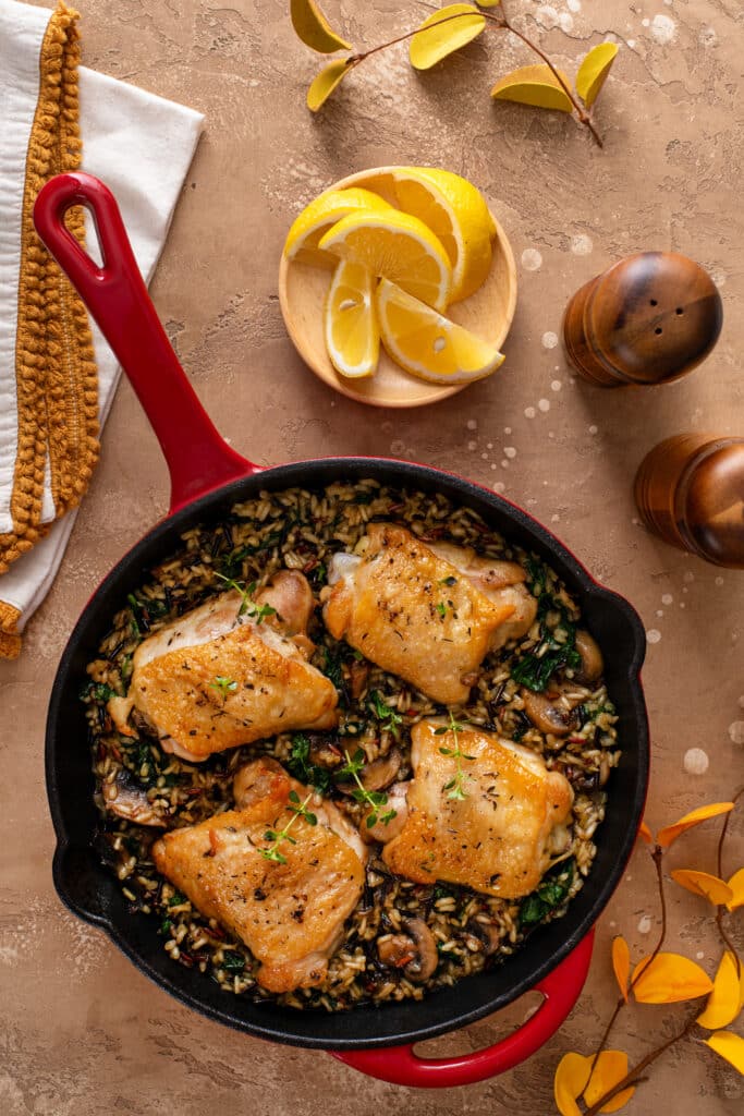 Chicken Thighs with Wild Rice in a pan