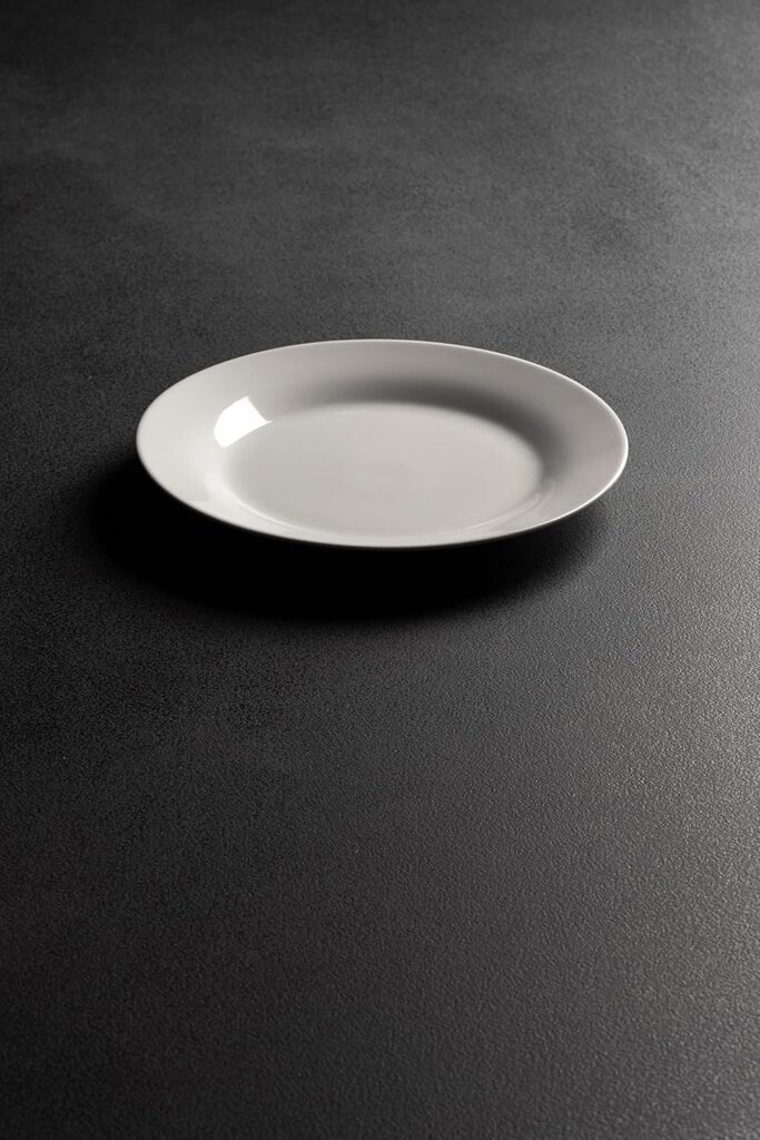 white plate in black bg