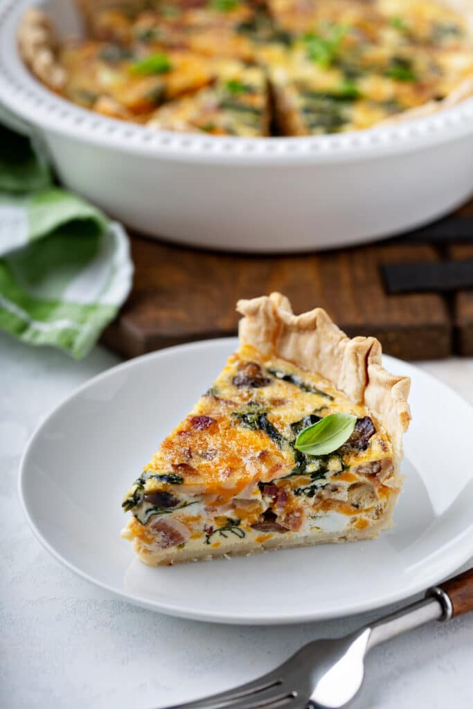 slice of spinach & bacon quiche
