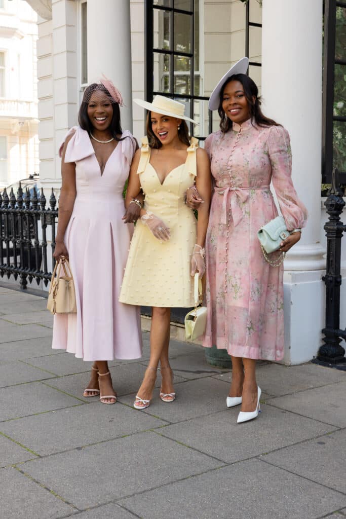 Erica A. Thomas with friends wearing pastels
