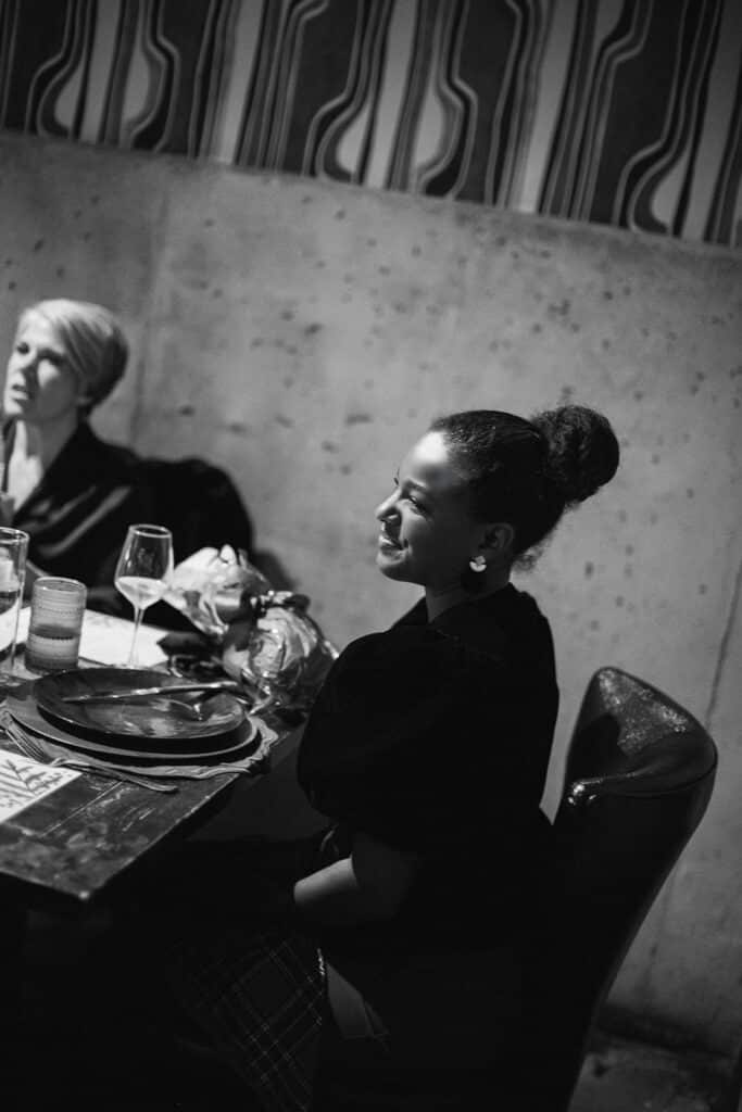 woman eating and chatting