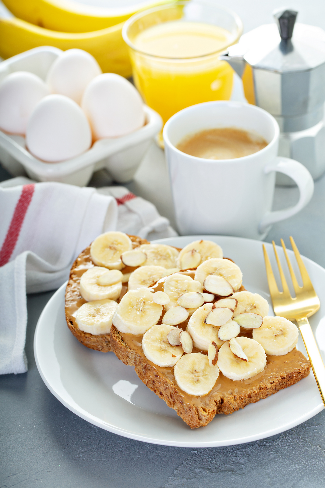Almond Butter Banana Toast top with banana and almonds
