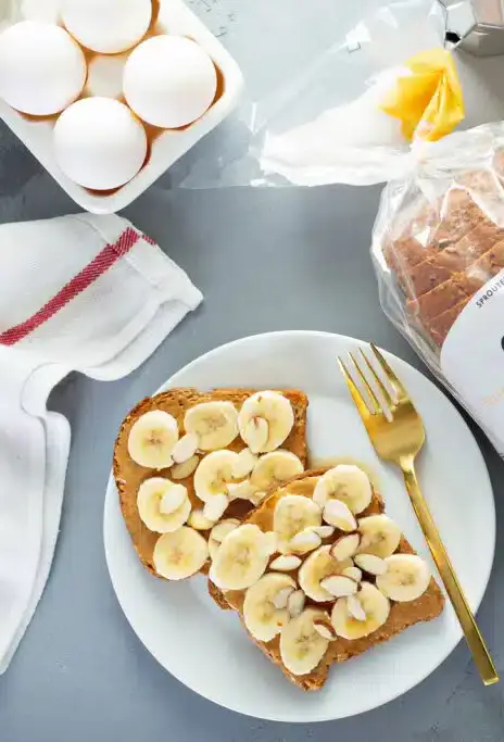 Almond Butter Banana Toast top with banana and almonds