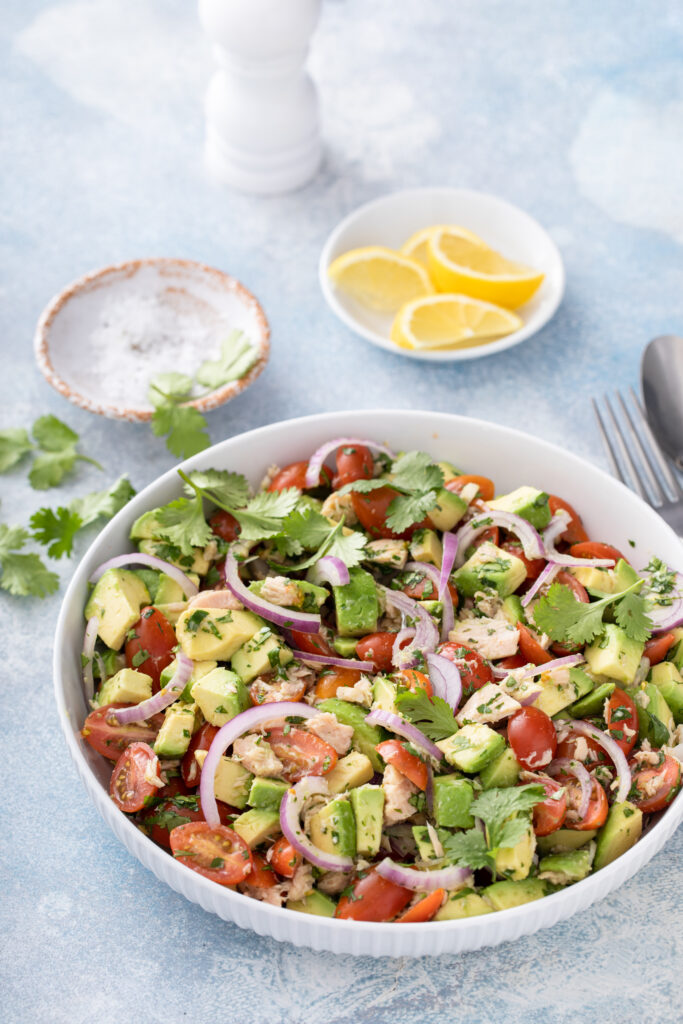 Need the perfect summer salad? Eating with Erica is sharing the perfect Summer Tuna Avocado Salad that is a MUST make this year! Click to make it!