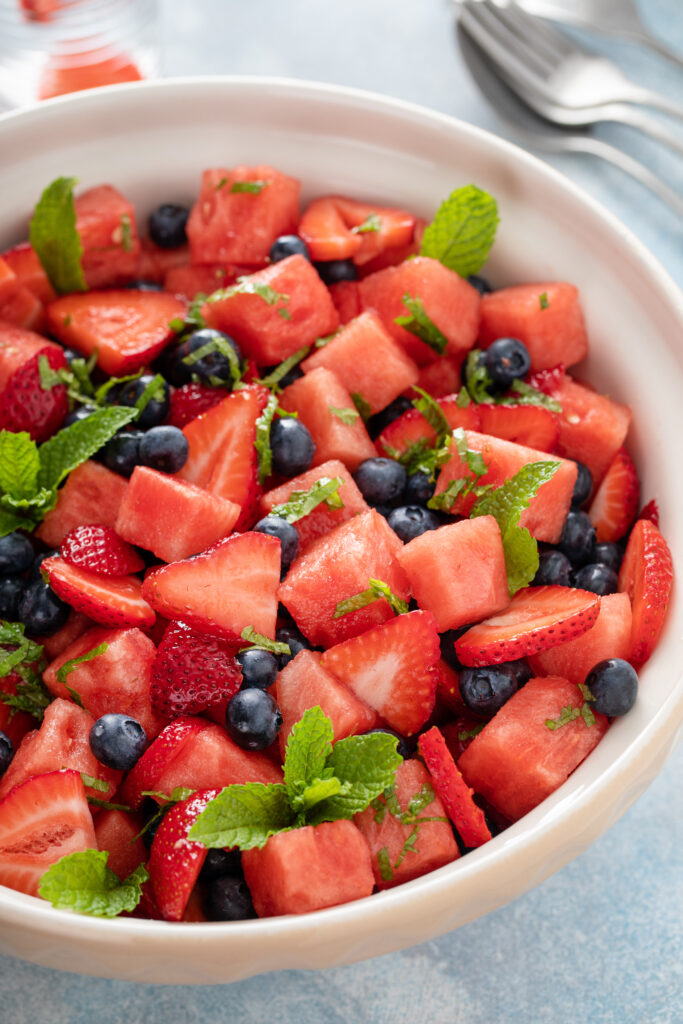 Looking for the perfect July 4th summer salad? You have to try this Watermelon Berry Summer Salad ASAP! It is absolutely perfect for any get together this Independence Day holiday!