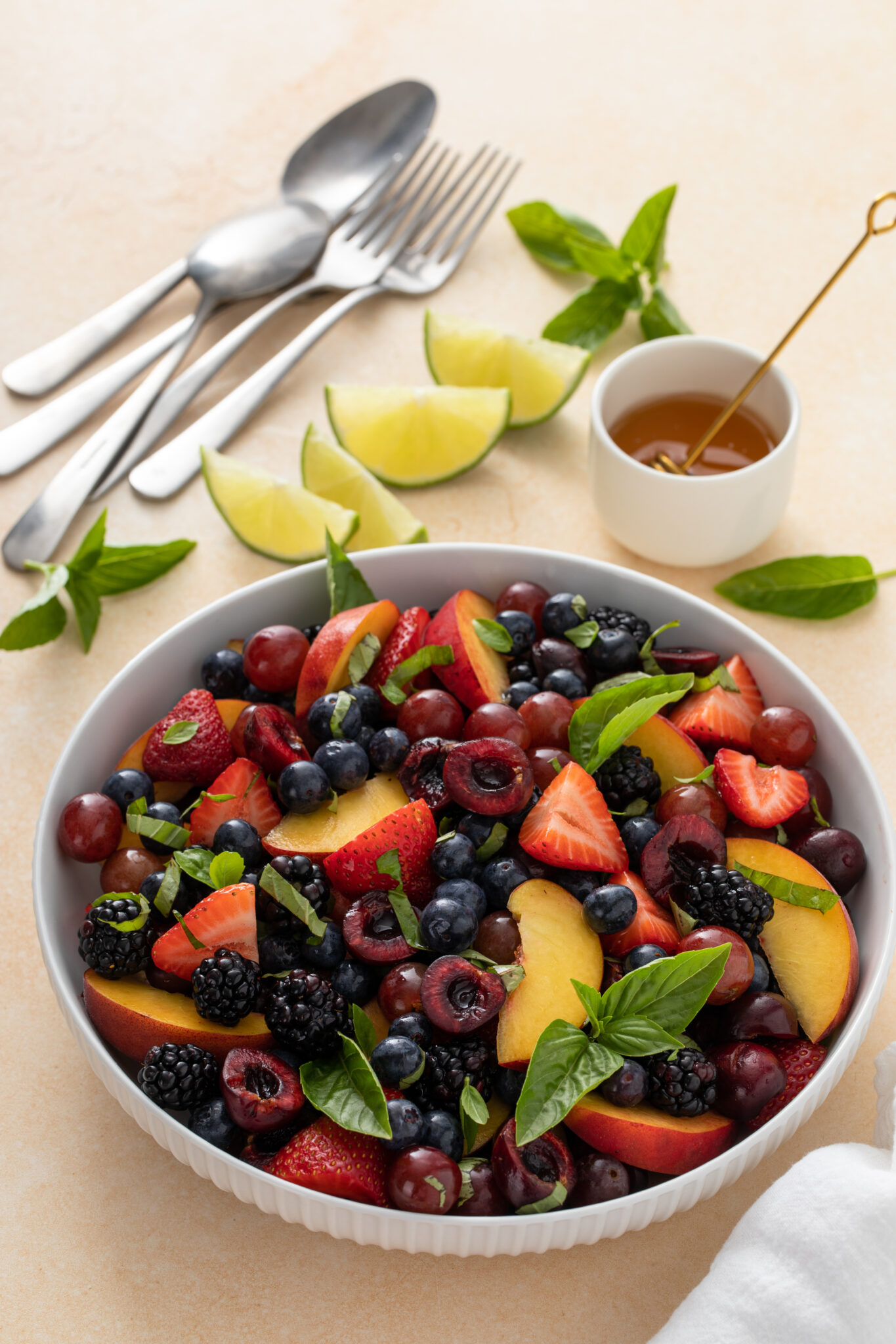 Recipe: Honey Basil Peach Fruit Salad - Eating With Erica