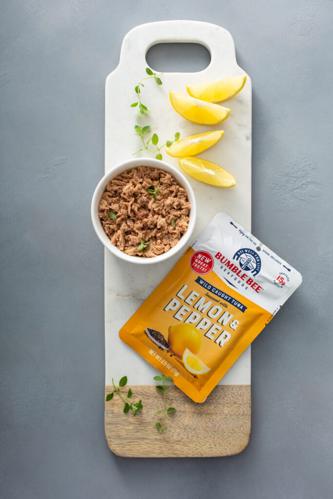Build your own delicious tuna snack from ingredients to topping and more with this delicious Tuna Board idea.  Set out a tuna mixture, your favorite crackers, fresh topping, fruits, and more- and voila- an easy snack that everyone will love! 
