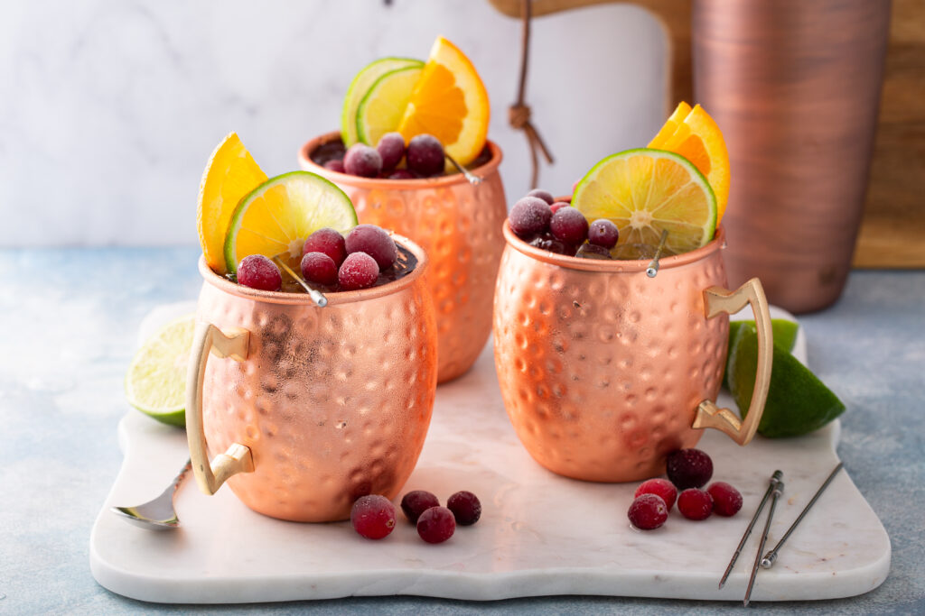 Looking for the perfect festive cocktail? This Cranberry Moscow Mule is a fun, festive take on the traditional moscow mule. Click HERE to make it ASAP! 
