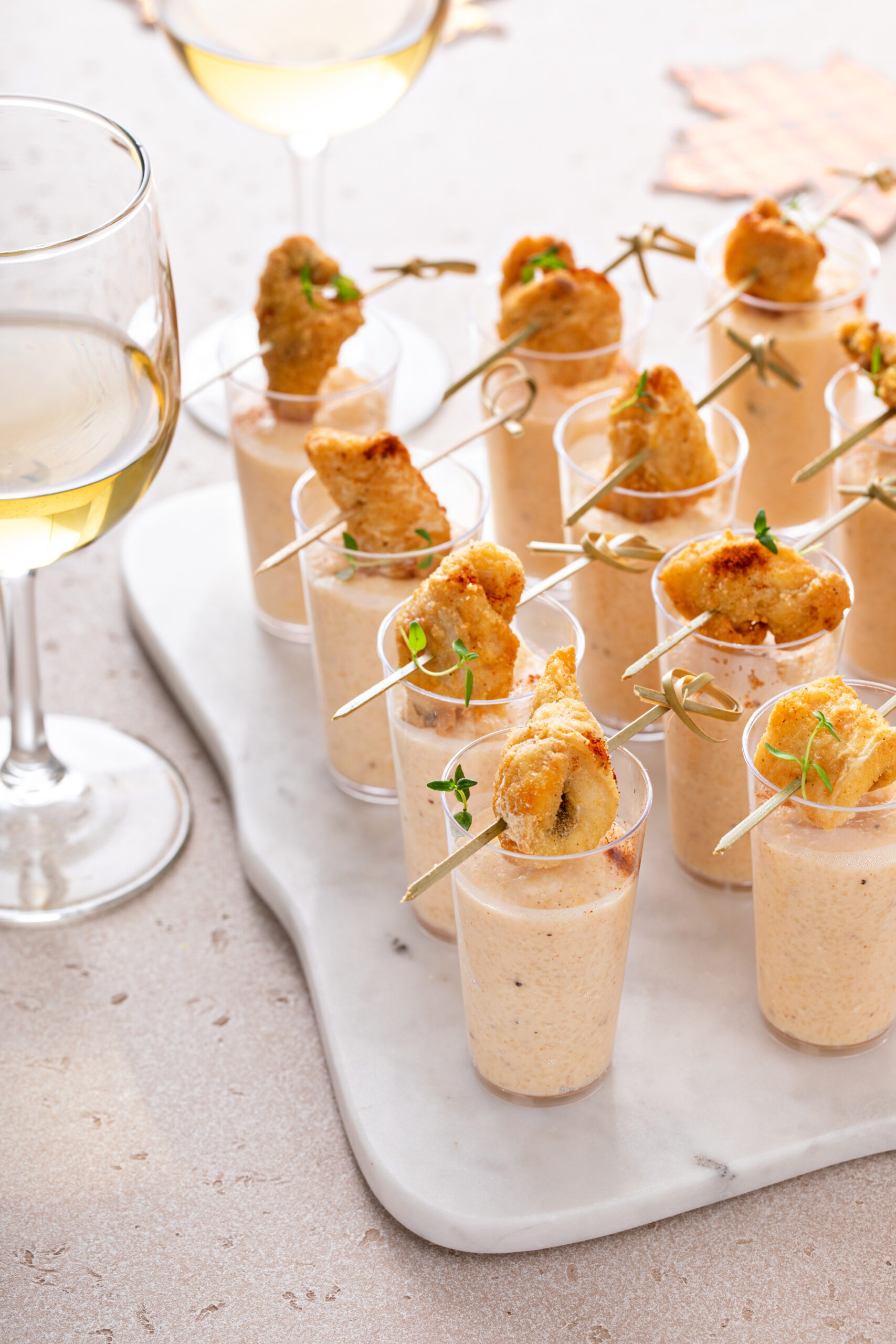 Hands down the perfect appetizer for any holiday party this year! Click here to try a Catfish and Grits Shooters!