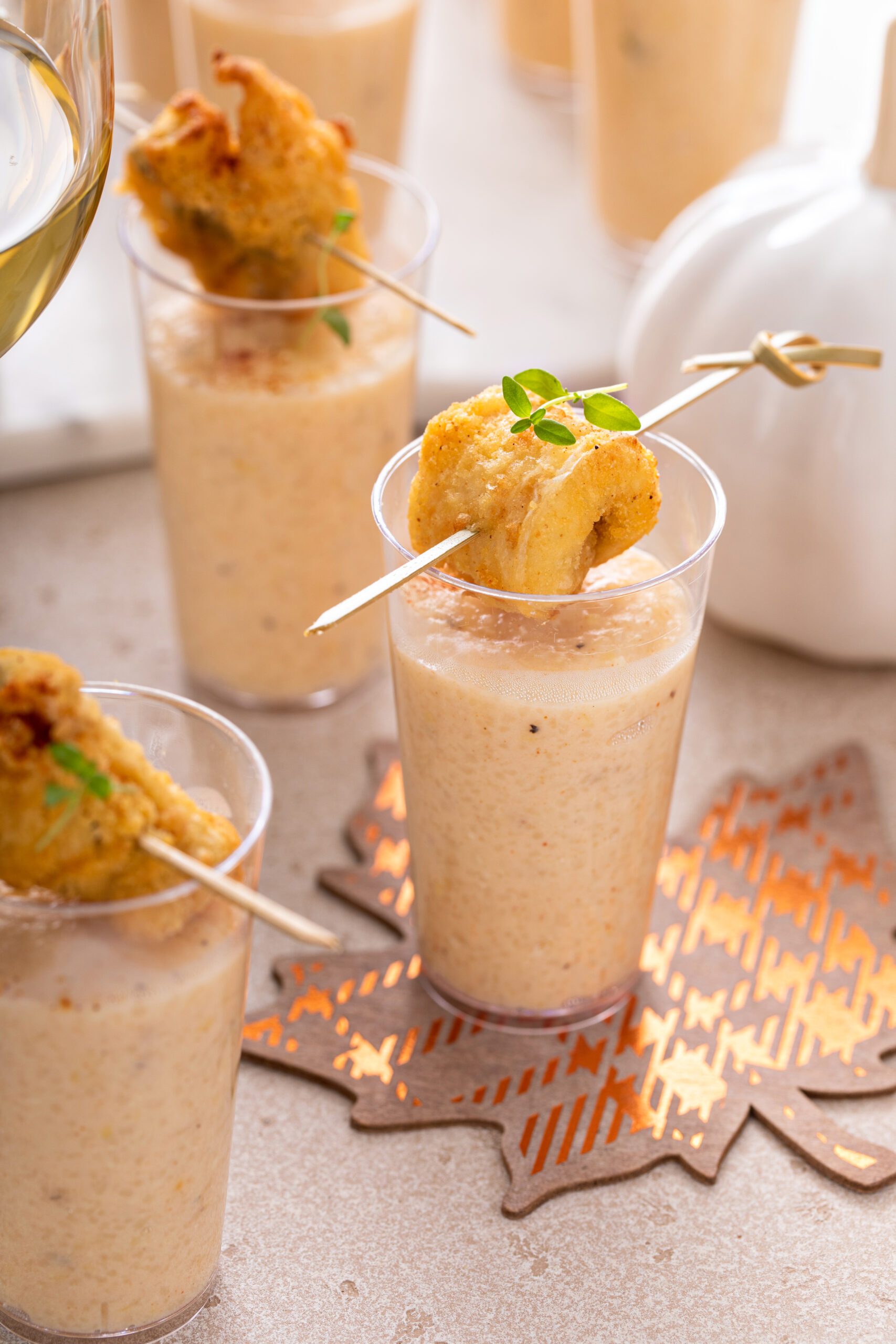 Hands down the perfect appetizer for any holiday party this year! Click here to try a Catfish and Grits Shooter!