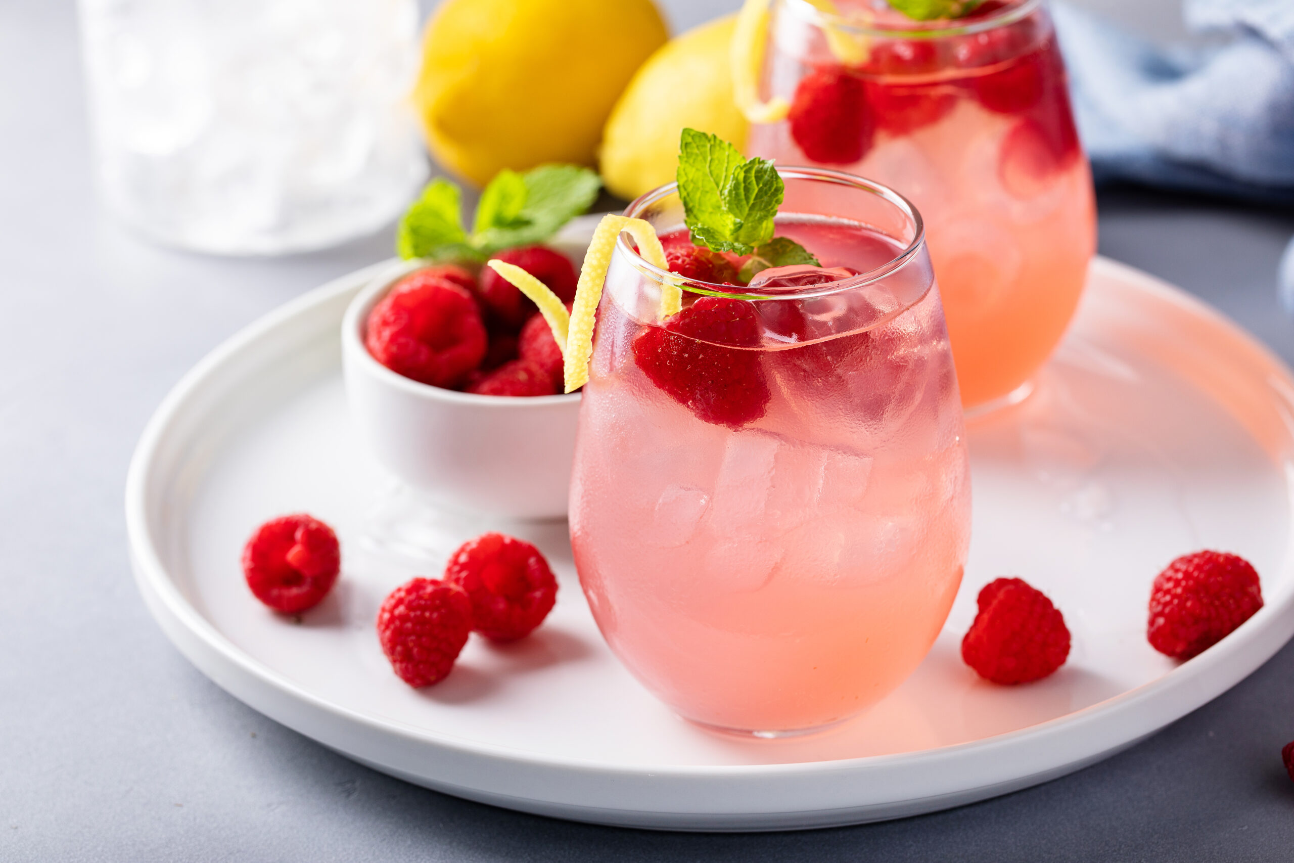Looking for the perfect summer day cocktail? You need to try this Delicious Raspberry Lemonade Cocktail ASAP! CLICK HERE to make it today!  