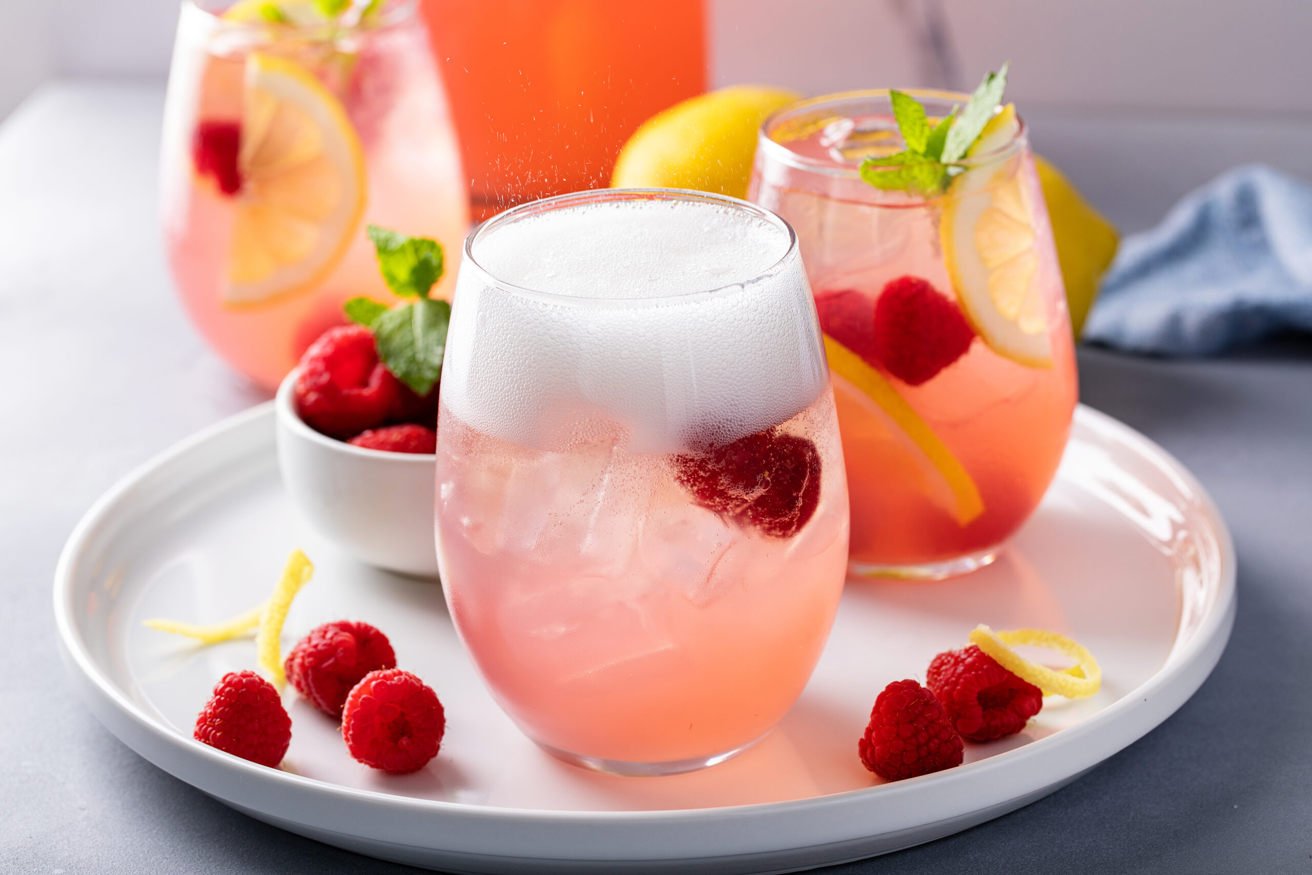 Looking for the perfect summer day cocktail? You need to try this Delicious Raspberry Lemonade Cocktail ASAP! CLICK HERE to make it today!  