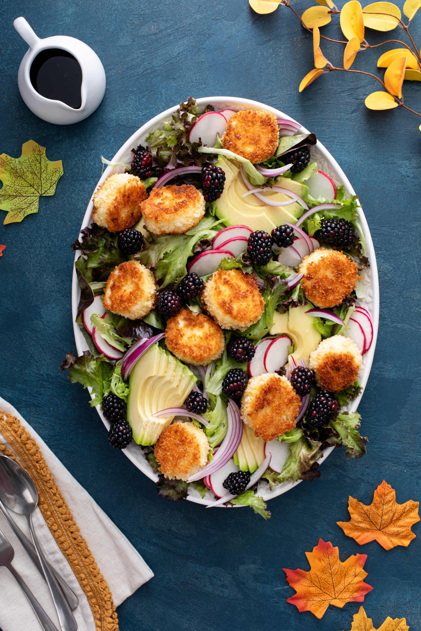 The perfect dinner salad recipe ever. Equal part sweet and savory this blackberry balsamic salad with fried goat cheese balls is to die for. Click here to make it!  