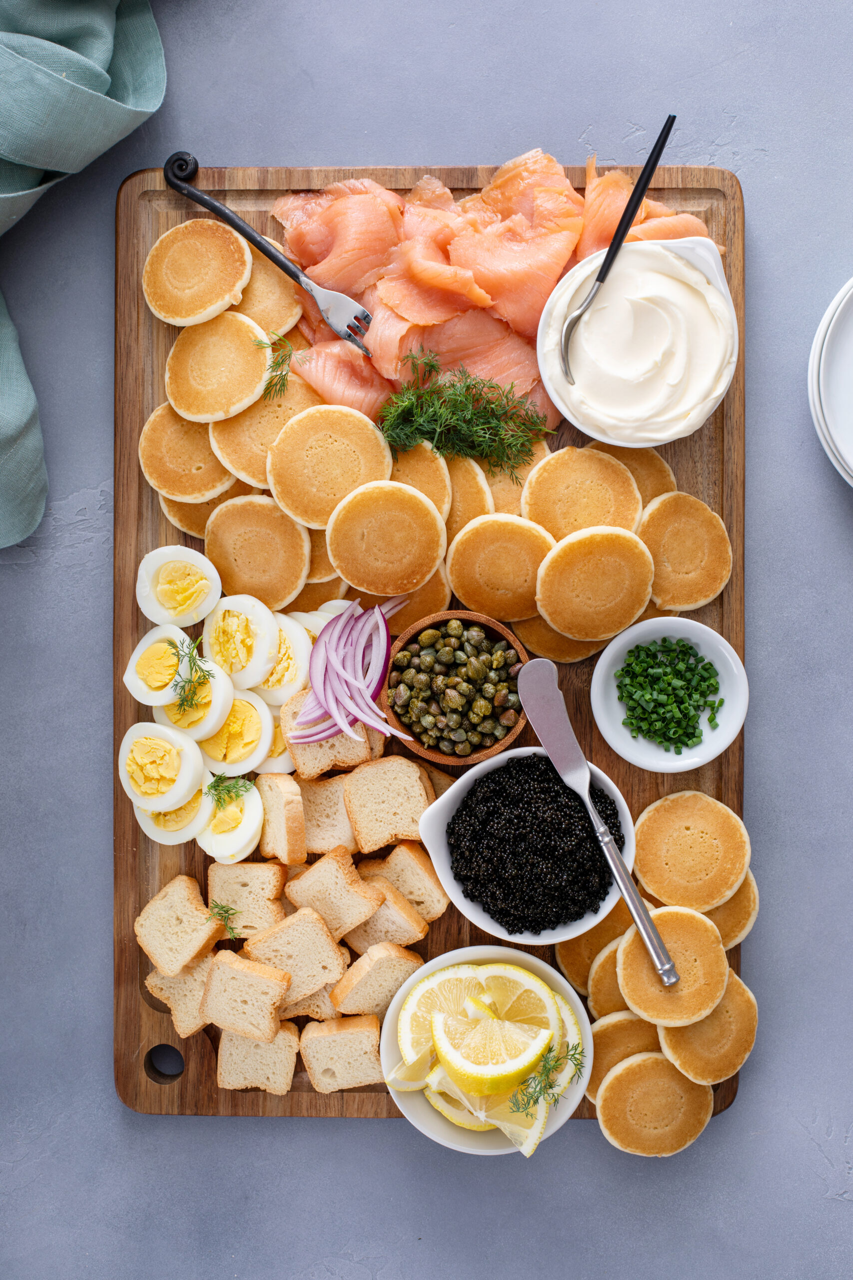 Looking to elevate your next dinner party? This is the perfect caviar board to do just that! CLICK HERE to make the perfect caviar board!