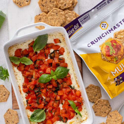 Craving a delicious appetizer? Baked Goat Cheese Bruschetta Dip with Crackers offers a creamy, cheesy bite with tangy tomatoes and crispy crackers—ideal for parties or a savory snack.