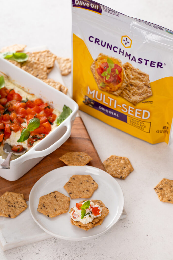 Impress your guests with Baked Goat Cheese Bruschetta Dip with Crackers—a creamy, cheesy dip topped with fresh, tangy tomatoes and served with crispy crackers. Perfect for parties or a flavorful snack!