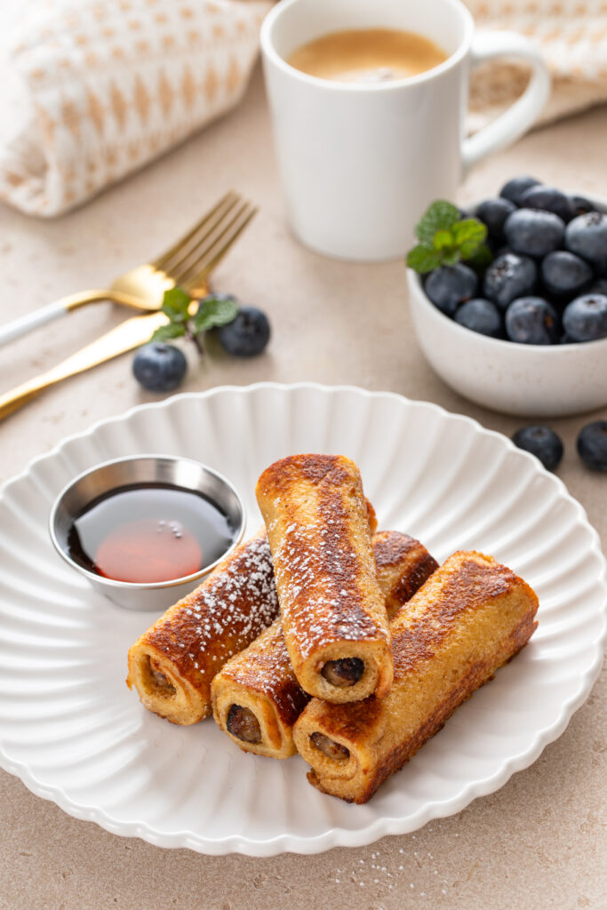 Indulge in a breakfast delight with sausage French toast roll-ups, featuring a delicious recipe from Atlanta blogger Eating with Erica. Perfect for a cozy morning or special brunch.