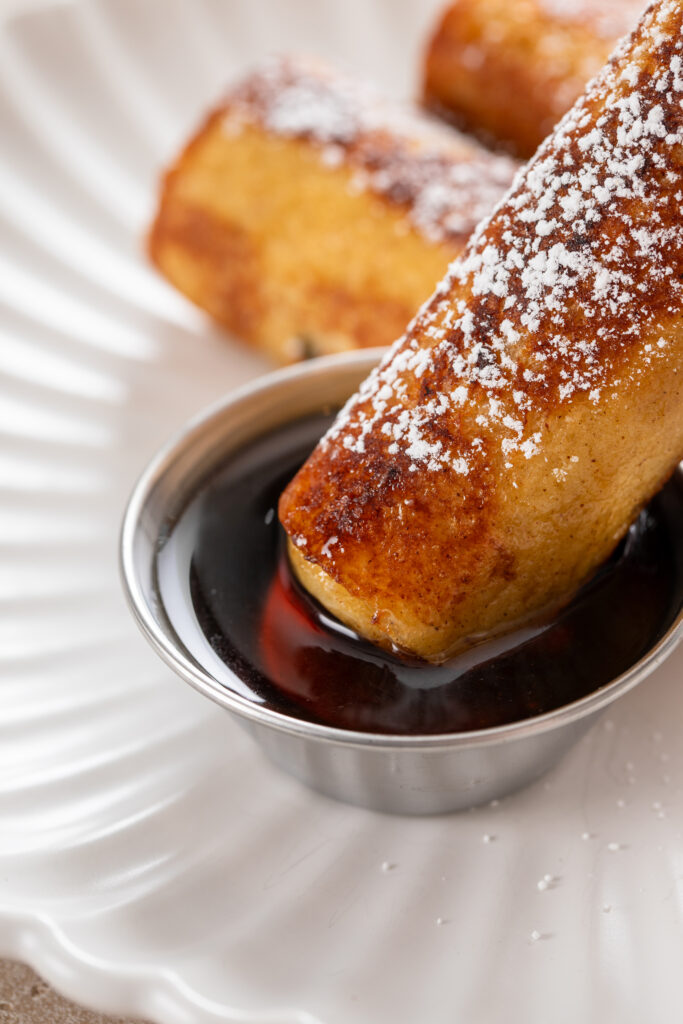 Treat yourself to sausage French toast roll-ups, a mouthwatering breakfast recipe from Atlanta blogger Eating with Erica. Ideal for a special brunch or a cozy morning at home.