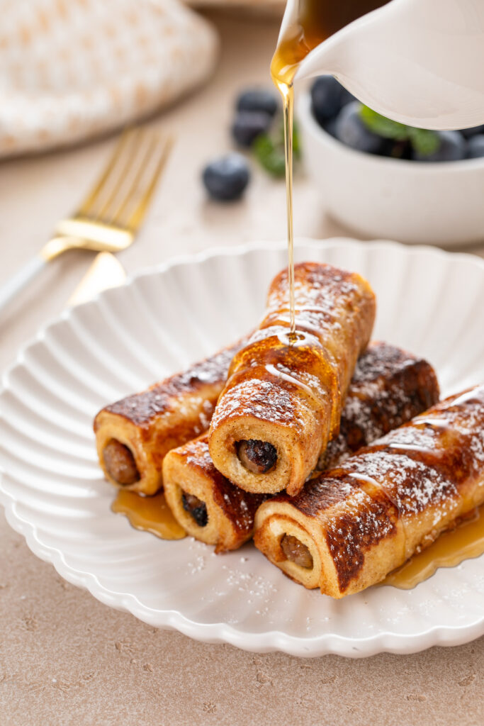 Indulge in a breakfast delight with sausage French toast roll-ups, featuring a delicious recipe from Atlanta blogger Eating with Erica. Perfect for a cozy morning or special brunch.