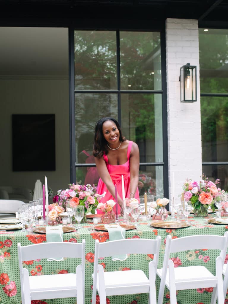 Erica A. Thomas setting up the table