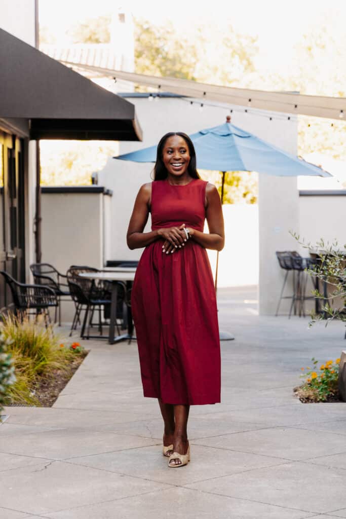Erica A. Thomas in red