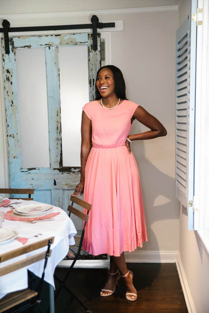 Erica A. Thomas wearing a pink dress