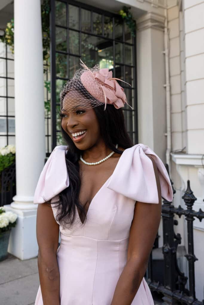 Erica A. Thomas in a blush pink dress in Ascot 2025