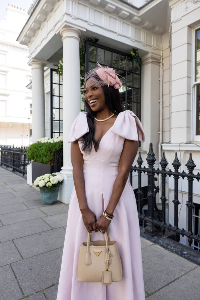 Erica A. Thomas with a prada bag