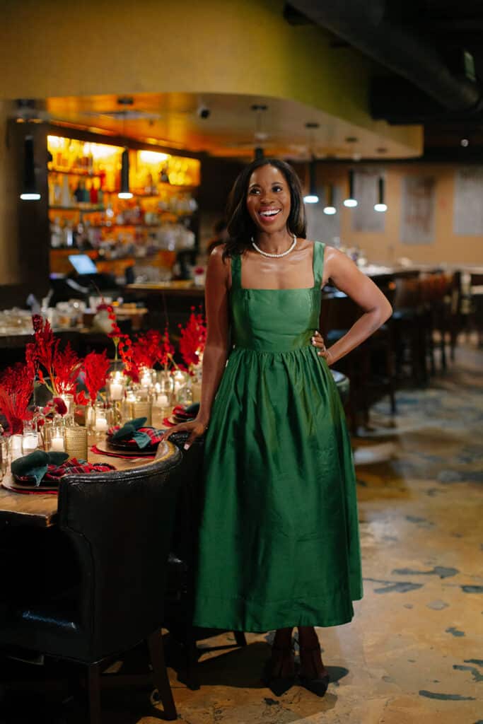 Erica-A.-Thomas-wearing-green-dress