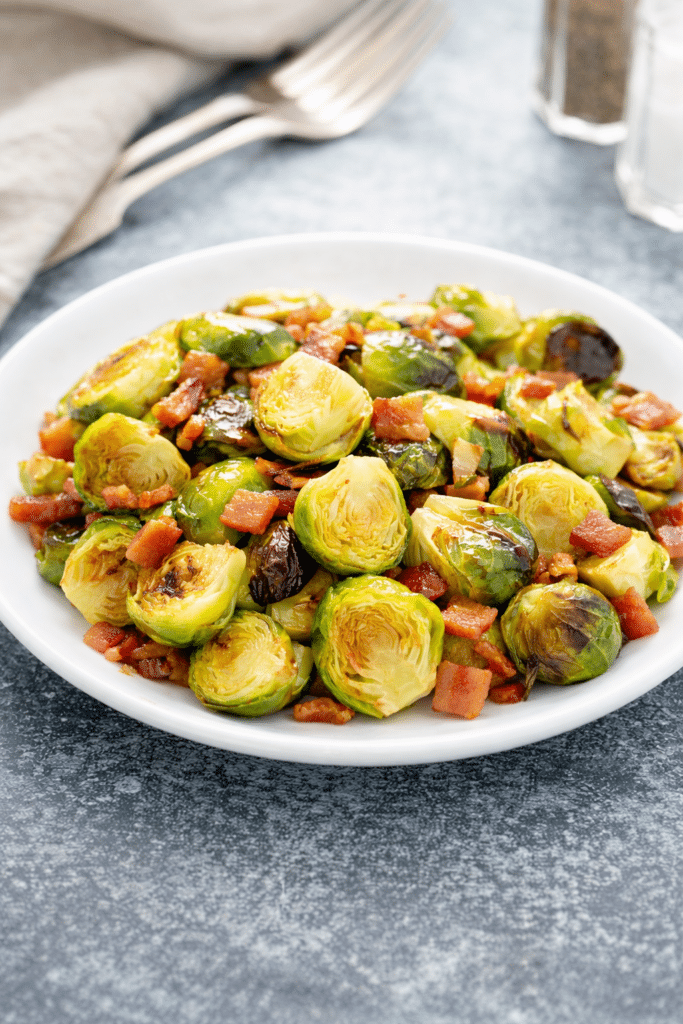 honey bacon balsamic roasted brussels sprouts in a plate