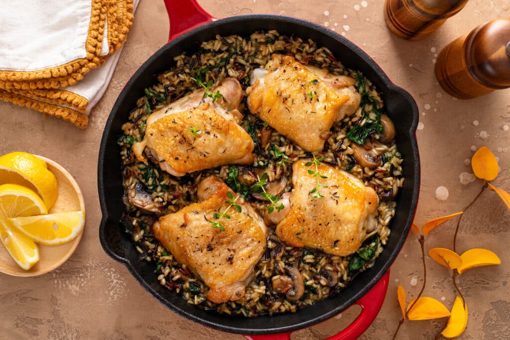 Chicken Thighs with Wild Rice in Skillet