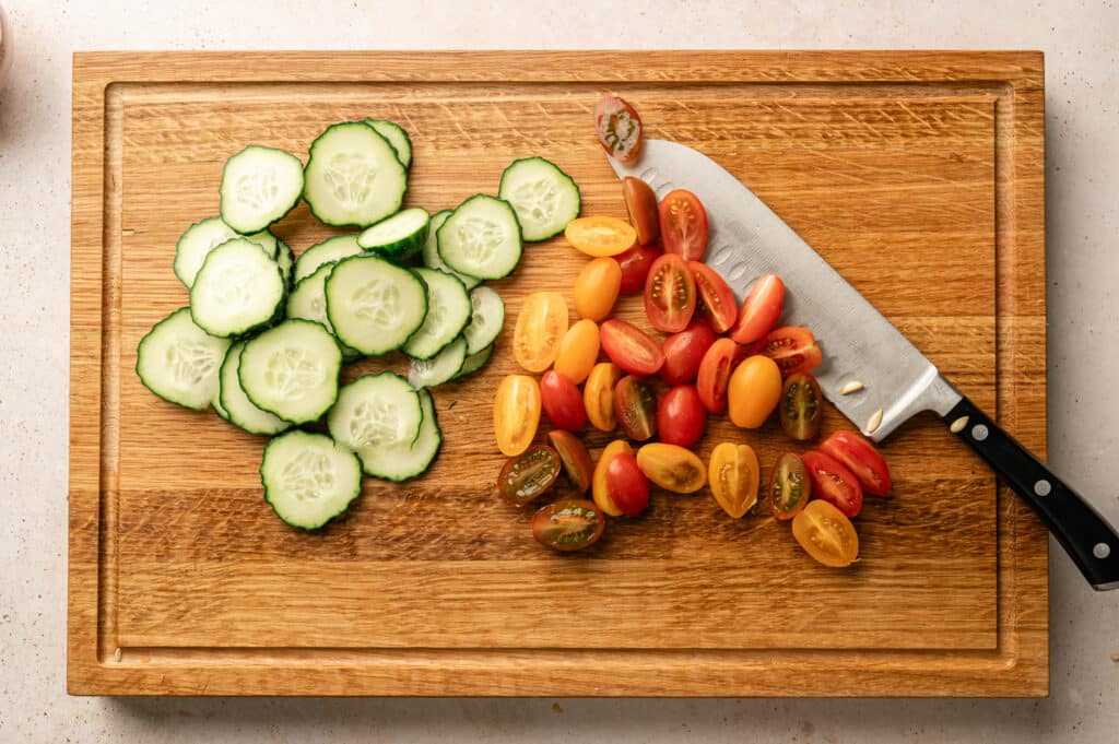 A fresh summer watermelon board is the perfect warm-weather appetizer. It is light, colorful, and easy to assemble with seasonal ingredients like watermelon, cucumber, and tomatoes.