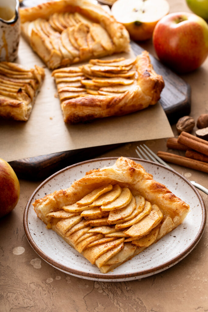 Overhead of apple galette with vanilla ice cream and caramel