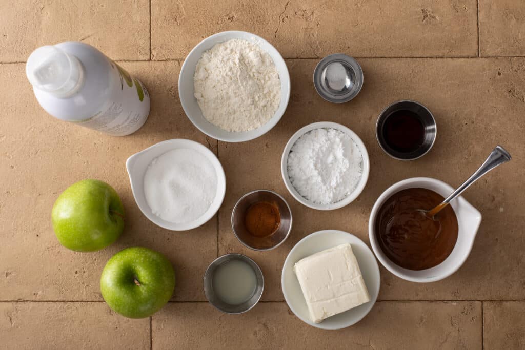 Ingredients for Air Fryer Apple Fries with Caramel Cream Dip flat lay shot