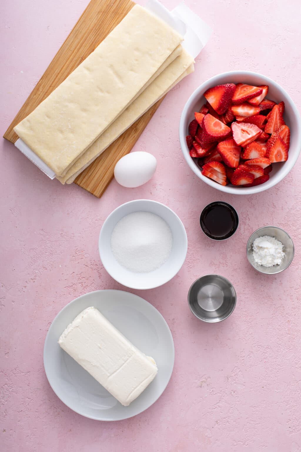 Ingredients for cheese strawberry danish , flat lay shot