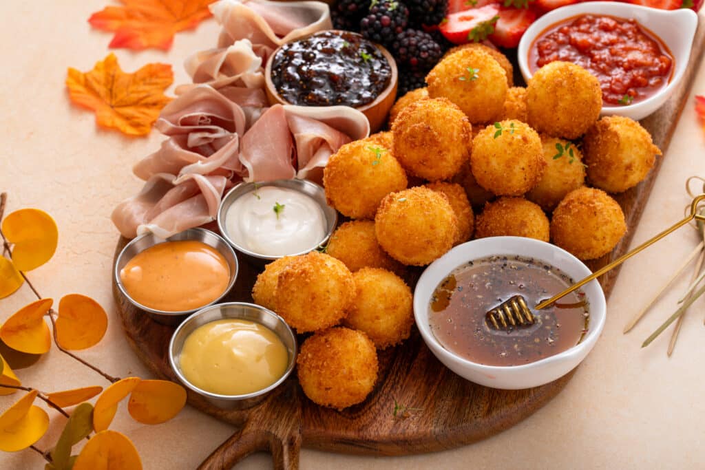 Perfect Fried Goat Cheese Board with honey and different dipping sauce