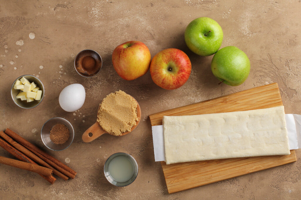 Close-up of baked apple galette with fanned cinnamon apple slices