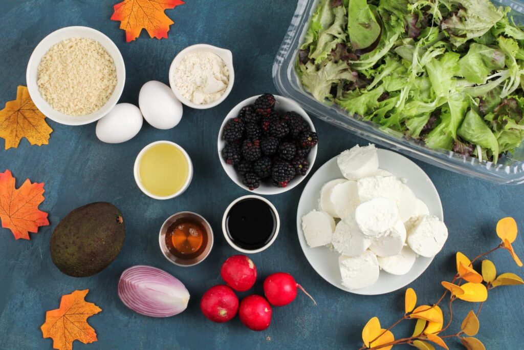 Ingredients for Blackberry Balsamic Salad with Fried Goat Cheese fat lay shot