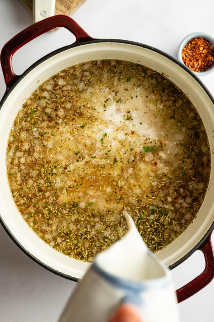 Adding the cream of White Sausage tortellini soup
