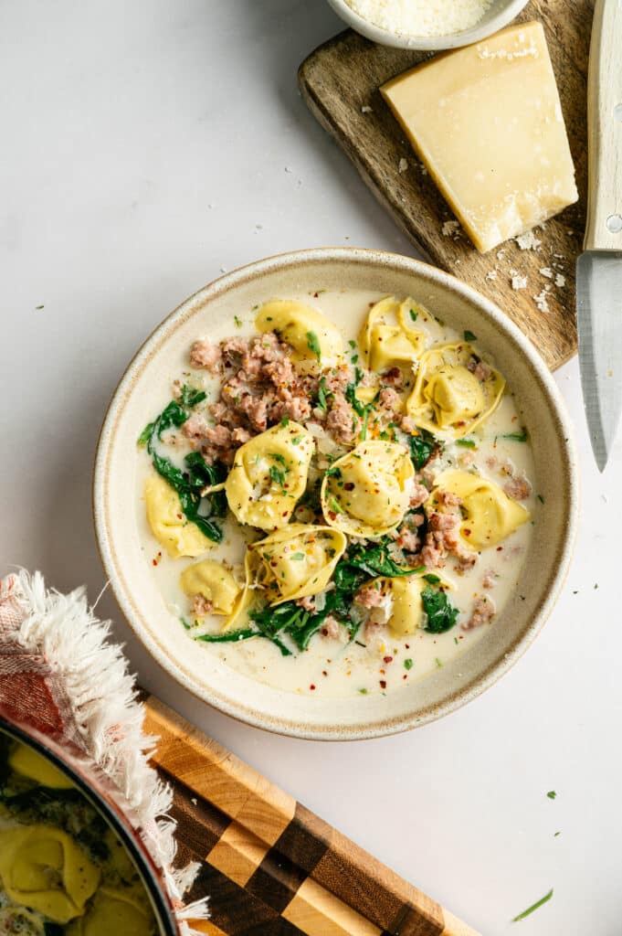 Serving shot with cheese White Sausage tortellini soup