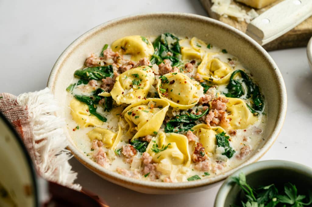 White Sausage Tortellini Soup in a serving pan 