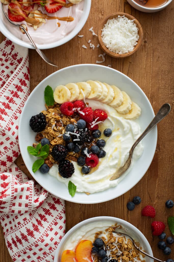 berrier and shredded coconut toppings Greek Yogurt Bowls 
