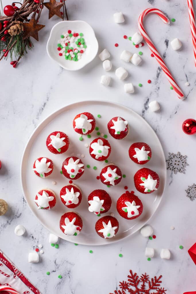 holiday settings served with candy canes and marshmallows for Strawberry Banana Santa Hats