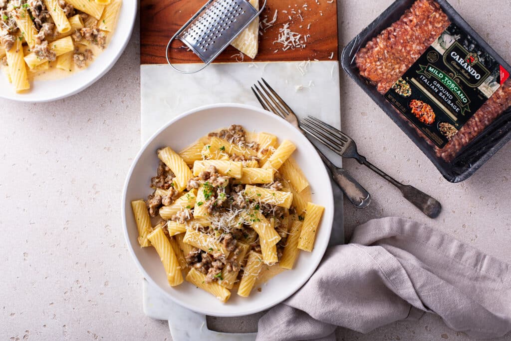 Sausage Rigatoni Pasta shot with uncooked sausages