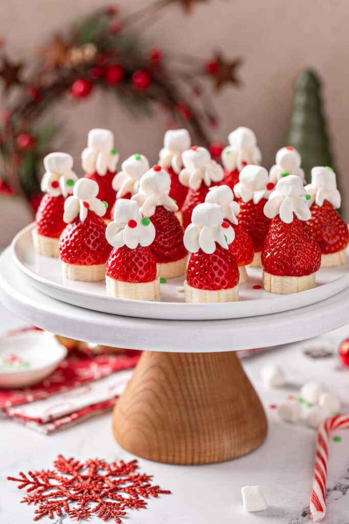 Served in cake stand Strawberry Banana Santa Hats