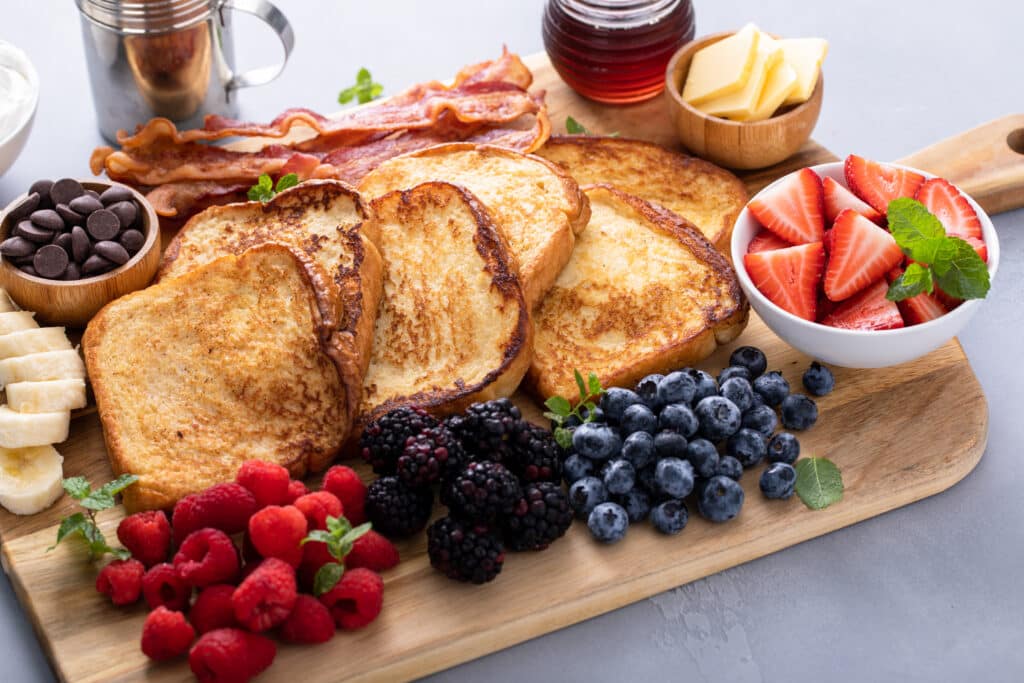 All Ingredients and garnishes of Easy French Toast Boardpresent on this image