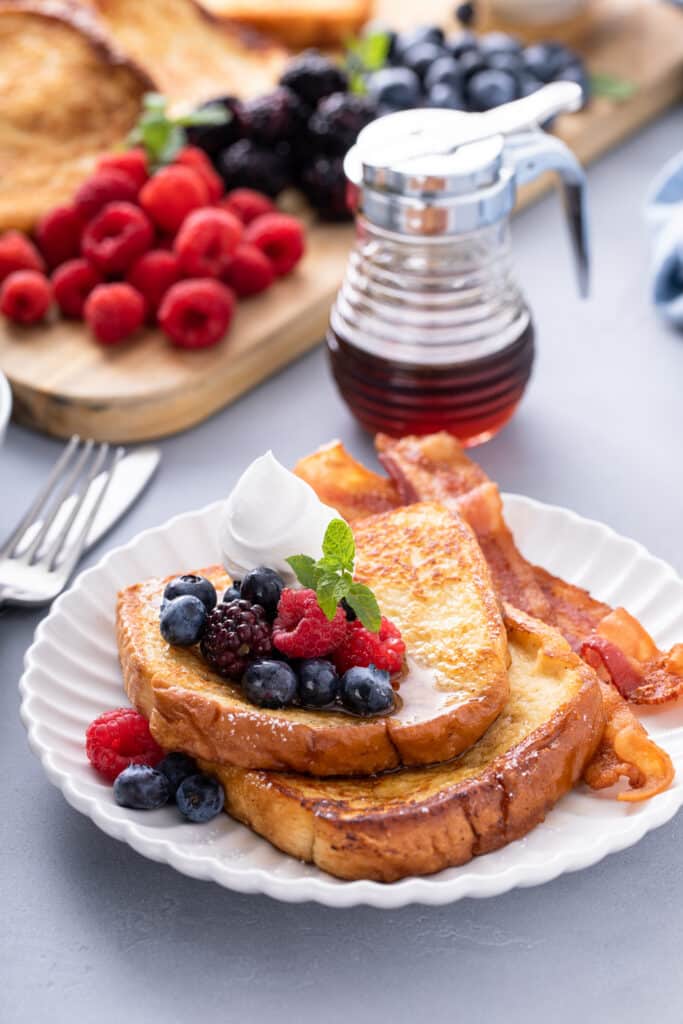 One serving of Easy French Toast Board with syrup and fruits
