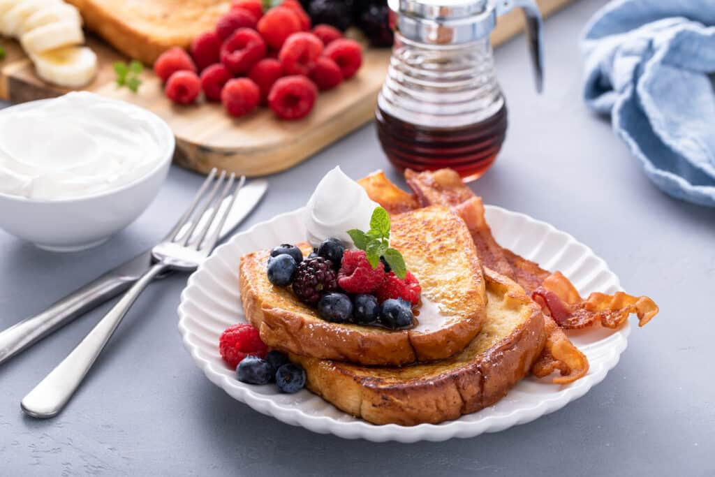 One serving of Easy French Toast Board with syrup and fruits