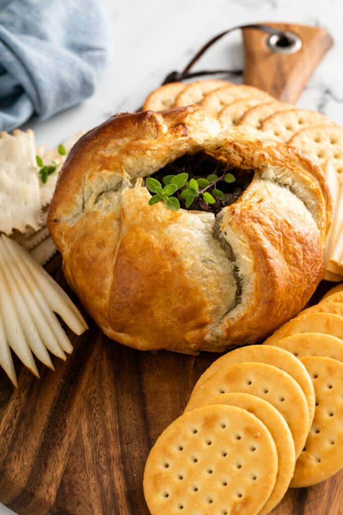 Baked Brie With Balsamic Caramelized Onions close up shot of pastry